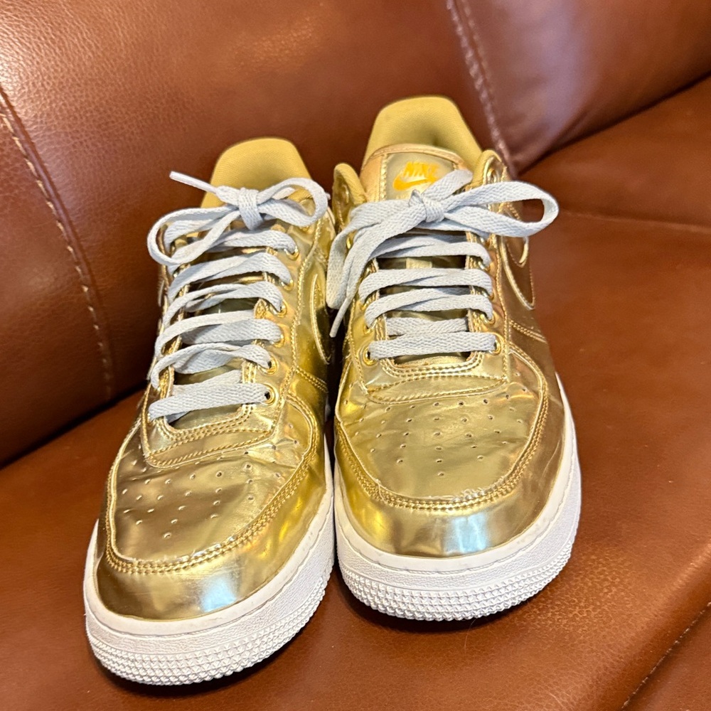 Nike Metallic Gold Sneakers with White Accents